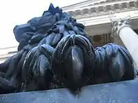 Detail of one of the two bronze lions outside the Congress of Deputies of Spain building