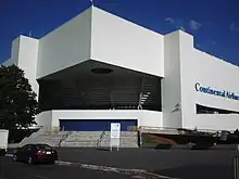 The corner of a white building in the daytime; the words "Continental Airlines" are visible on the right-hand side