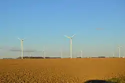 Fields and a wind farm just east of Convoy