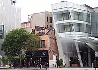 #35: The modest building on the left was owned in the early 19th century by a great-grandson of Peter Stuyvesant.  It was demolished for new construction.