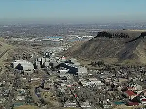 A color photograph showing the cityscape of Golden, Colorado, prominently showing the Coors brewing facility