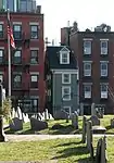 The Skinny House with Copp's Hill Burying Ground in the foreground