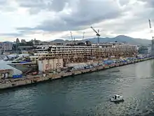 The wreck, with its superstructure being dismantled, in the Superbacino dock in Genoa, 12 September 2015