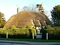 Church Cottage is a 16th-century building with cob walls and thatched roof