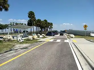 Parking lot between approach embankment to two bridges