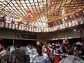 Another view of courtyard, devotees waiting for their turn