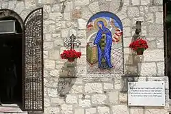 Icon of Saint Petka on the church wall