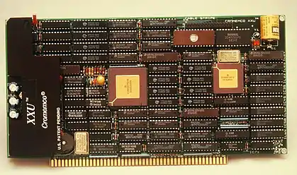 1980s Cromemco XXU, a Motorola 68020 processor S-100 bus card.  The axial parts between the ICs are decoupling capacitors.