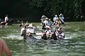 Crossing the river on horseback