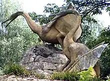 Side view of two pterosaur sculptures in Crystal Palace Park