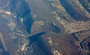 The Tuscarora Formation forms a clear anticline in Wills Mountain at Cumberland Narrows, Maryland