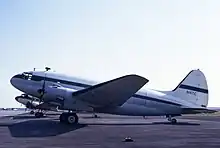 A Curtiss C-46 tailwheel airplane