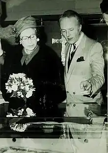 Black and white photograph of D. H. Turner with Queen Elizabeth II