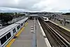 Daly City station viewed from the footbridge at the north end of the platforms, 2018