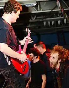 Dave Lawson playing guitar during a Zero Boys concert in 2014.