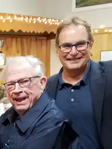 Weatherhead School of Management's David Cooperrider with Harvard Business School Dean Emeritus John McArthur in 2018.