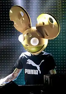 DJ with a mouse head mask performing live