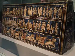 Standard of Ur; 2600–2400 BC; shell, red limestone and lapis lazuli on wood; length: 49.5 cm; from the Royal Cemetery at Ur; British Museum