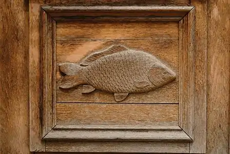 Detail from the entrance door:carved common carp