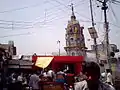 Exterior of Dhanokhar Mandir (a temple dedicated primarily to Lord Hanuman) from Dhanokhar Chauraha. This temple has a moderate sized pond at its back.