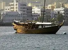 Image 12Muscat Harbor - A traditional Omani Dhow lies anchored in the Muscat Harbor (World's largest natural harbor) (from Tourism in Oman)