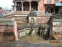 Layaku Hiti, Bhaktapur, with Hari Shankar Sattal behind it