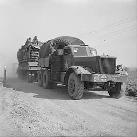 Diamond T tank transporter with a Churchill tank during preparations for crossing the Rhine