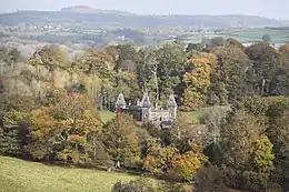 a large house in a woodland park