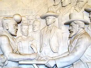 Dingane signing a treaty with Piet Retief, as depicted in the Voortrekker Monument