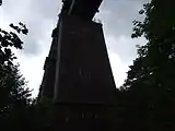 A brick strengthening pier from below