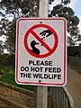 Signs in Australia discouraging locals against feeding urban wildlife