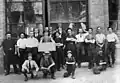 1915 photograph of the staff of Austral Carriage Works shows the facade of what is now beneath the Claver Theatre and Consilo Aquatic Complex. This facade is heritage listed and provides part of the All Hallows' School Boundary Street fence line.