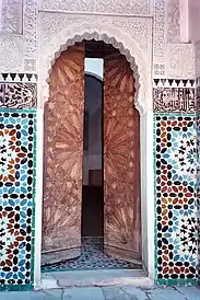 Doorway decorated with strapwork, arabesques and tilework