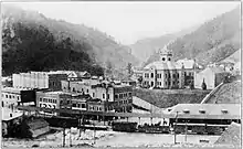 Photograph view of buildings in downtown Welch, West Virginia, in 1915.