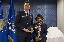 Air Force Space Commander presents Gladys West with an award as she is inducted into the Air Force Space and Missile Pioneers Hall of Fame for her GPS work on December 6, 2018.