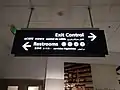 Sign in English, Chinese, Japanese, Spanish, and Arabic at Detroit Metropolitan Airport.