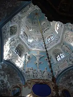 The interior is richly decorated with high relief compositions