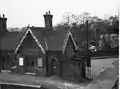 Duffield Station booking office with accommodation crossing gate