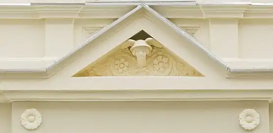 Adorned pediment