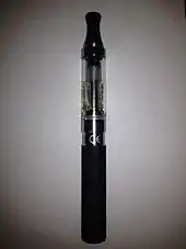 eGo style e-cigarette with a top-coil clearomizer. Silica fibers are hanging down freely inside of the tank, drawing e-liquid by capillary action to the coil that is located directly under the mouthpiece.