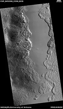 Wide view of part of Milankovic Crater, as seen by HiRISE under HiWish program  Many depressions here contain ice in their walls.