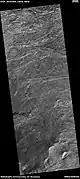 Wide view of layers in Crommelin crater, as seen by HiRISE.  Parts of this photo are enlarged in following images.