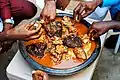 A family eating fufu