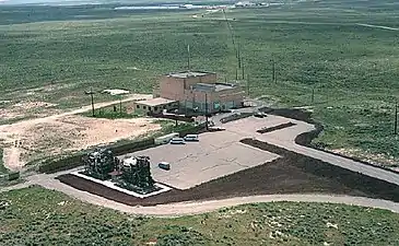 The reactor is in the building at center; the two structures lower left are reactors from the Aircraft Nuclear Propulsion Project.