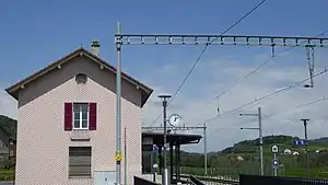 Two-story building with gabled roof