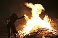 The Bonfire lit to welcome the Beltane morning with a ritual dancer