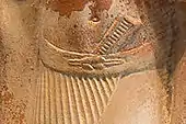 Detail of Egyptian statue dating from 2350 BC depicting a reef knot securing a belt