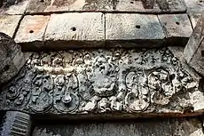 Lintel of the central tower: Krishna, lifting Govardhana hill and fighting the Kaliya snake, whilst standing on a kala