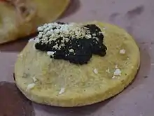 Bean mini-gordita flavored with avocado leaf Veracruz-style