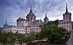 A large building complex with towers.